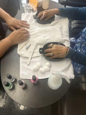 Soaking for the manicure.