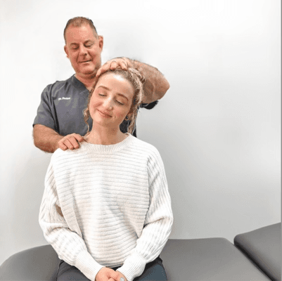 patient at chiropractic adjustment with Dr. David Packer