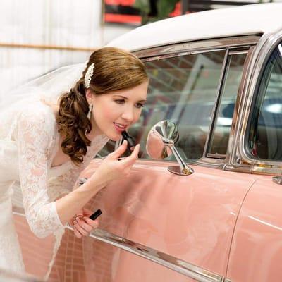 Touching up the lipstick before the ceremony. My makeup was perfect! No other touch ups needed!