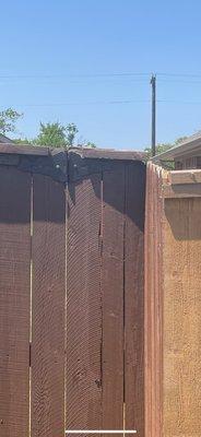 After: Rhino Home Care set the fence on the property line and stained the fence.