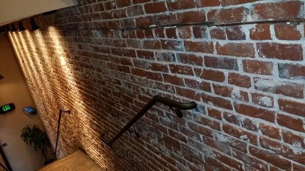 Exposed brick leading down from Quad to Gaslamp Tavern.