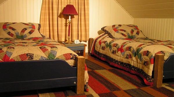 Loft bedroom with two twin beds