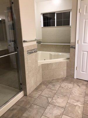 View of the remodel with the jacuzzi tub in the background.