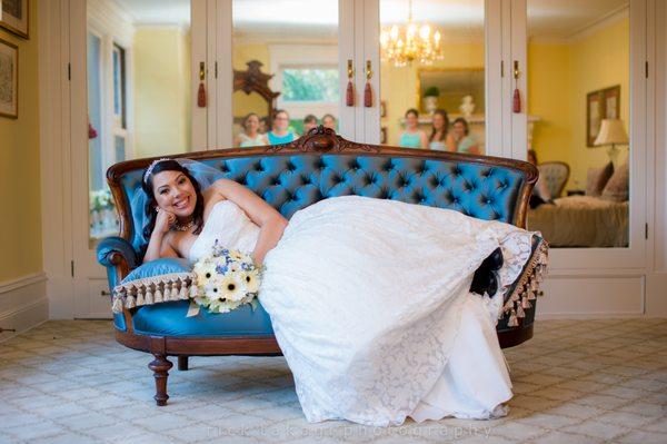 This is such a great couch and the mirror allows the Bridesmaids to be in the shot as well.