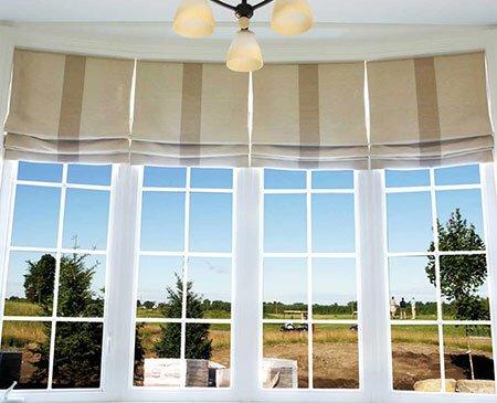 Beautiful functional Soft Roman Shades.