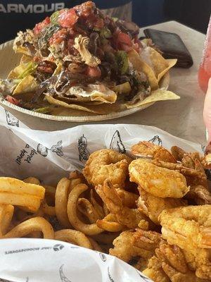 the nachos (back) and the fried shrimp (front)