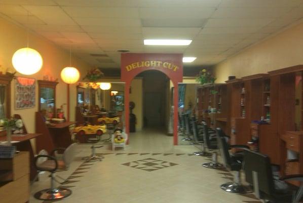 Your view of the barbershop and beauty/hair salon when you walk into Delight Cuts