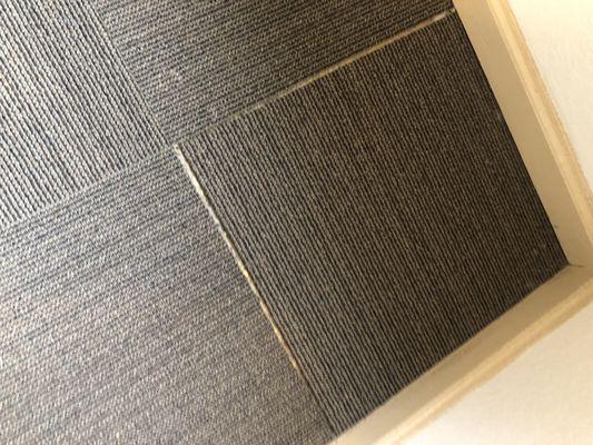 These very thin (Office Depot I think) squares are what you  get to walk around in your luxurious apartment.