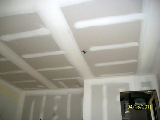 Sheetrock, tape and spackle