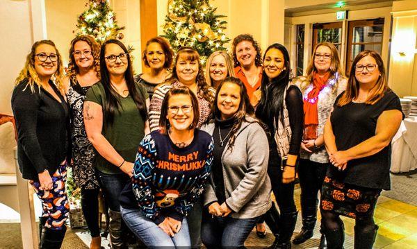 office gals all dolled up for Christmas fun