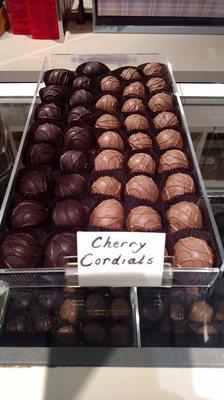 Dark and milk cherry cordials in the case.