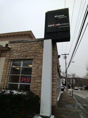 Side of Storefront, Verizon Sign