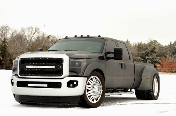 Black Rhino Project  2014 Ford F350 Dually on airbags / suicide doors / much more...  Build for promotions at SEMA 2013.