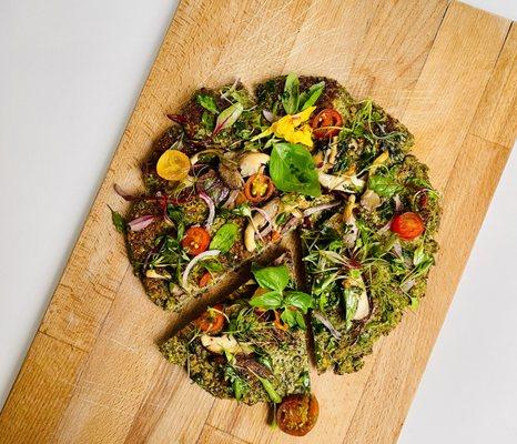 OMG Mung Bean Pizza (Vegan): Organic Mung bean dough, soaked in alkaline water, blended with fresh cilantro, parsley. farm-to-table toppings