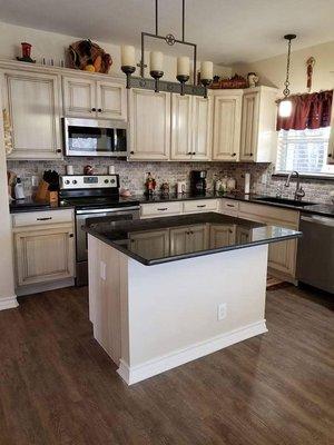 Updated Island and counter tops. Absolute Black Granite.