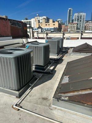 Rooftop commercial air conditioning units before inspection and repair