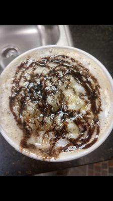 Carmel & Vanilla Latte with chocolate drizzle.