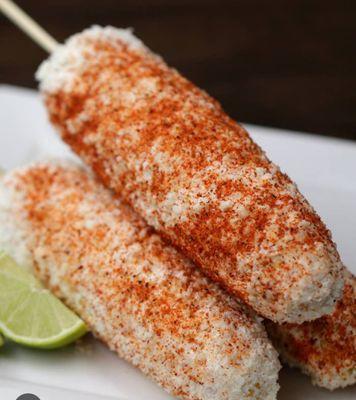 Elotes with mayo cheese and chilli Tajín