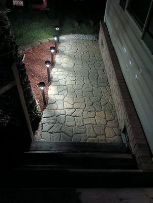 Paver walkway installation with lighting