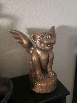 Found this phenomenal gargoyle at one of their art sales. You never know what treasures you'll find!