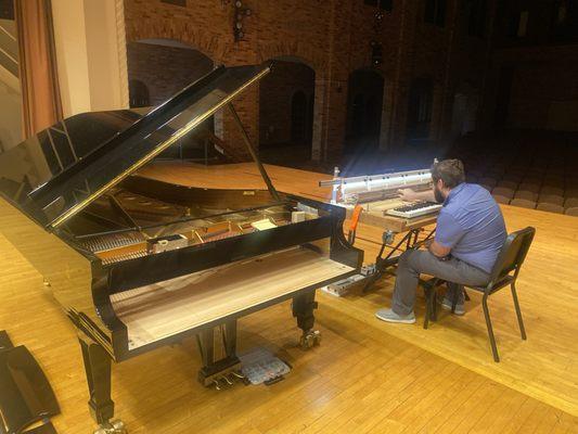 Concert prep of University $150,000 concert grand piano