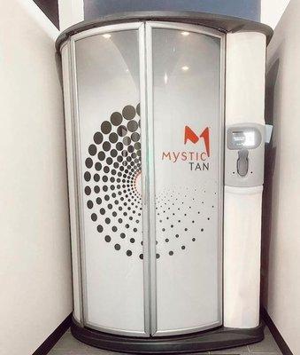 Mystic Tan automated spray tanning booth