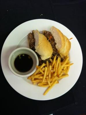 Roast Prime Rib Sandwich with Carmelized onions, mushrooms, and provolone cheese. Served with Au Jus for dipping.