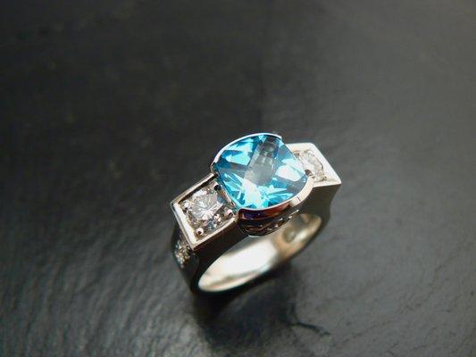 Blue topaz ring with diamonds in white gold, my client ordered this as her retirement gift to herself.