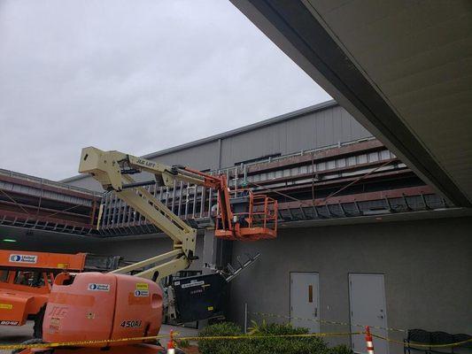 ARC Abatement's Louisiana office is handling the strategic demolition of the exterior soffit around the entire building.