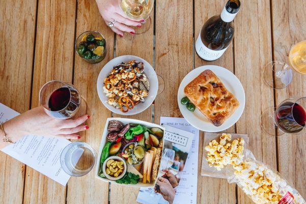 Along side your favorite glass of wine, enjoy a selection of snacks sourced locally.