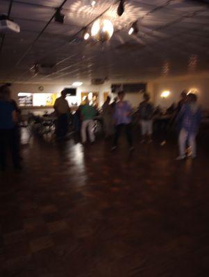 People dancing at VFW 7262 in Greenville, OH, as part of the Darkest County Singles