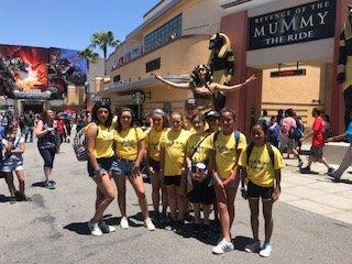 Our girls group taking a ride with The Mummy.