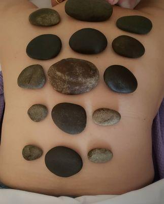 Hot stone back treatment