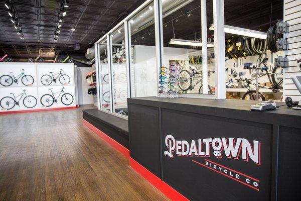 Window to repair shop in Pedaltown Bicycle Company