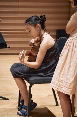 Guitar performance at our student recital