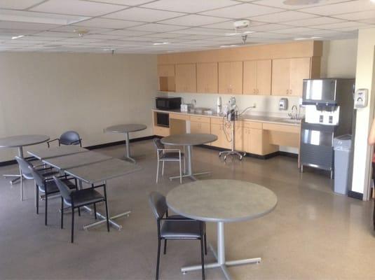 Open cafeteria, break room with microwave and refrigerator. They label your personal food for you.