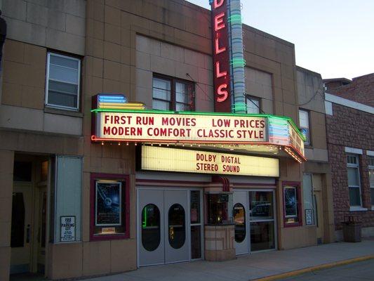 Street view of the Dells Theatre.  The current movies will be showing on the marquee.