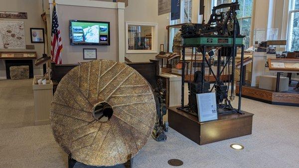 Millstone and clock mechanism