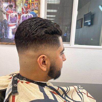 Middle fade with more contrast. Brush back style