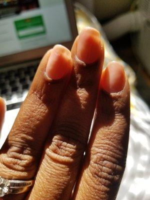 One of the worst "gel" manicures I've ever received.