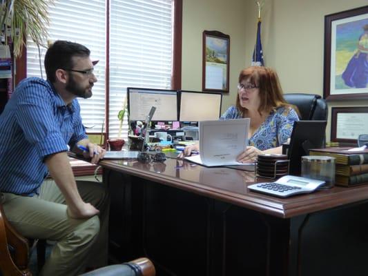 Richard and Carol Reithmiller discussing the clients of the day.