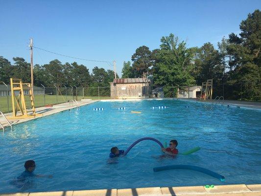 Pool: 3'- 12' deep with both low and high dive