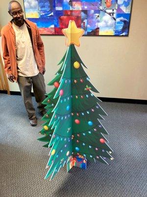 A large format printed die-cut Christmas tree.