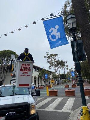 Flags on State Street created by ILRC