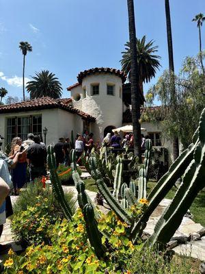 Hiram and Buena Whithead House, 1927. This house features, a stucco exterior, terra-cotta roof, tiles, & a prominent two-story  tower.