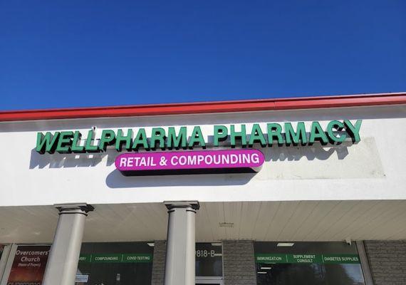 Front of the WellPharma Pharmacy store