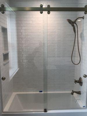 Frameless Double Barn Door Tub Enclosure