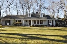 stunning 5 bdrm 4 bath home is situated on 1.5 acres of beautiful wooded prop. This exp ranch features many upscale amenities...