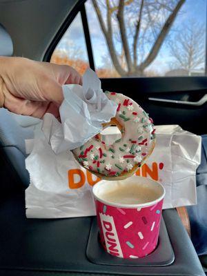 Vanilla Frosted Donut with Sprinkles and a classic Cappuccino!