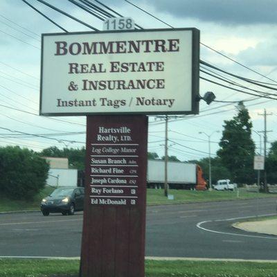 Sign outside our office in the parking lot.